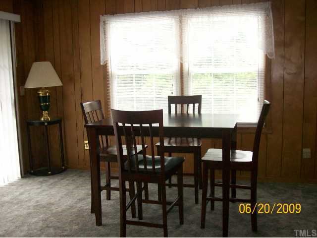 5031 Preacher Holmes Road Graham, NC 27253 - Photo 6 of 12 Dining and Living Area with Access to Deck overlooking the Pool
