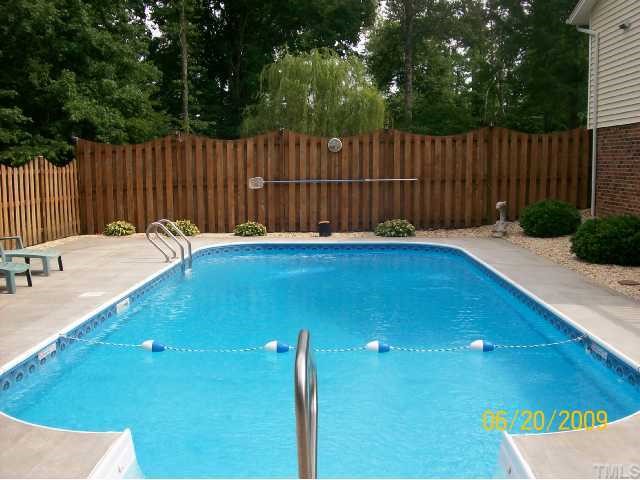 5031 Preacher Holmes Road Graham, NC 27253 - Photo 10 of 12 Beautiful 16x32 Inground Pool w/ Dolphin Fountain, Patio, and Privacy Fence .