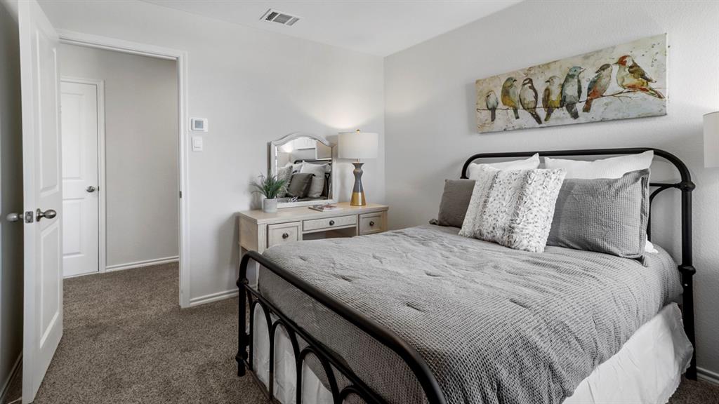 636 Dunham Road Nevada, TX 75173 - Photo 4 of 31 Plush carpeting throughout with light gray wall paint