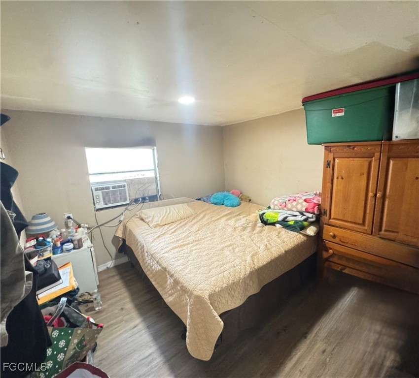 306 13th Street Southeast Immokalee, FL 34142 - Photo 6 of 11 a bedroom with a bed and dresser