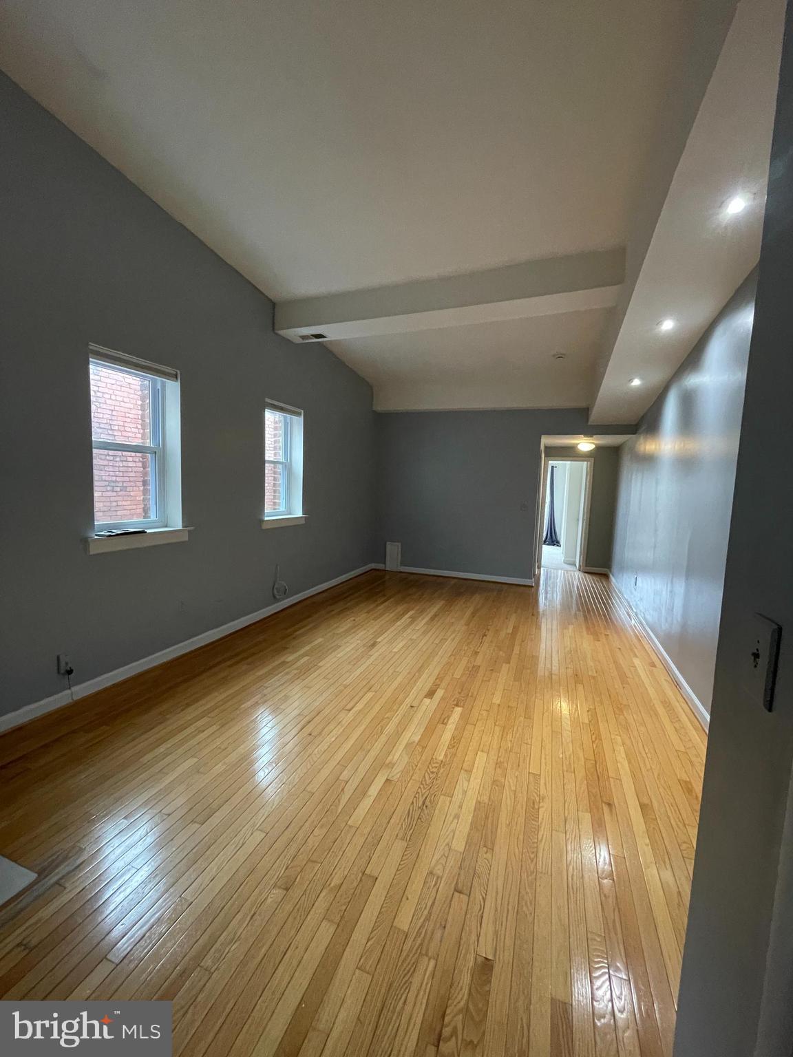 1856 Kalorama Road Northwest, Unit 4 Washington, DC 20009 - Photo 3 of 6 a view of empty room with wooden floor