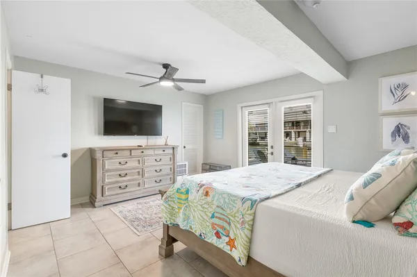 a dining room with a table and chairs