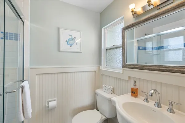 a bathroom with a sink and a shower