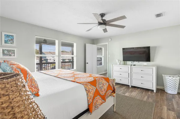 a bathroom with a sink and a mirror with toilet