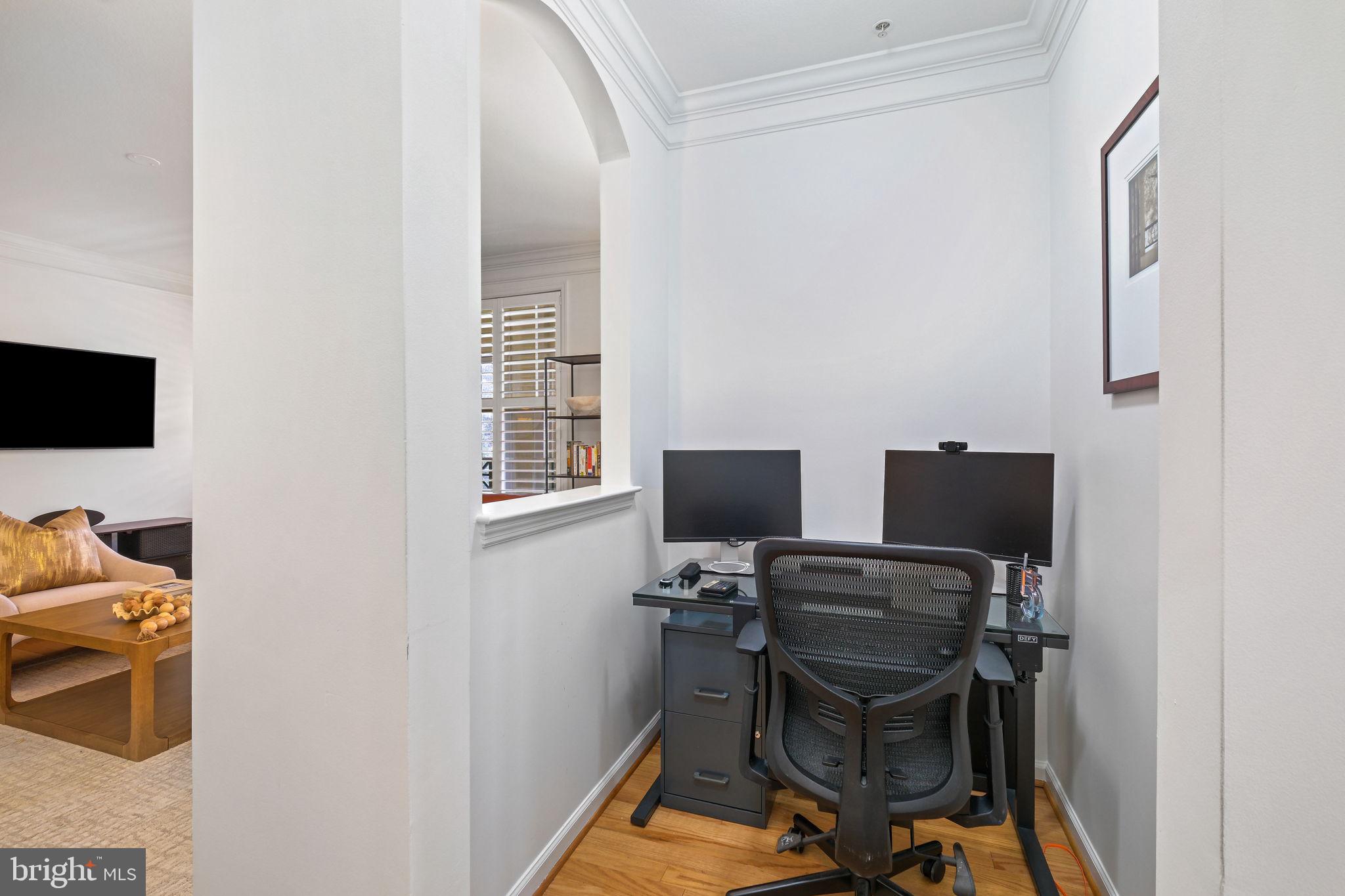 8 Granite Place, Unit 266 Gaithersburg, MD 20878 - Photo 15 of 49 a view of a workspace with furniture and a window