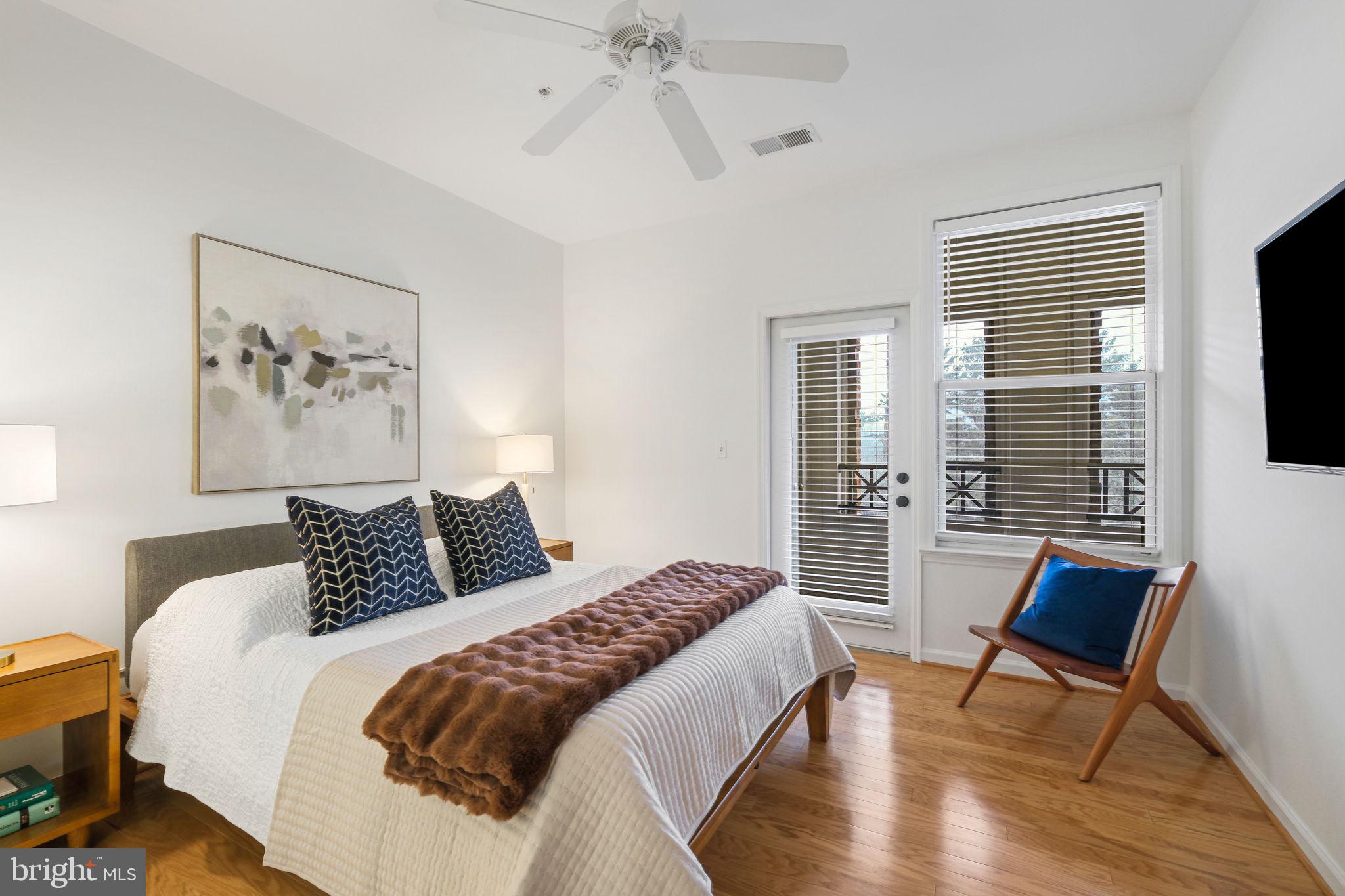 8 Granite Place, Unit 266 Gaithersburg, MD 20878 - Photo 16 of 49 a bedroom with a bed and a window