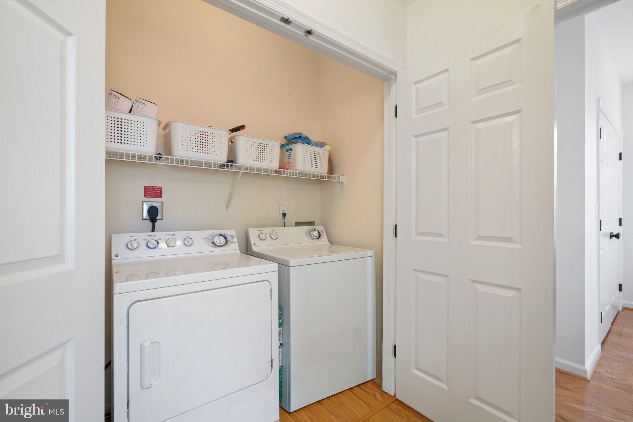 8 Granite Place, Unit 266 Gaithersburg, MD 20878 - Photo 24 of 49 a view of storage and utility room with washer and dryer