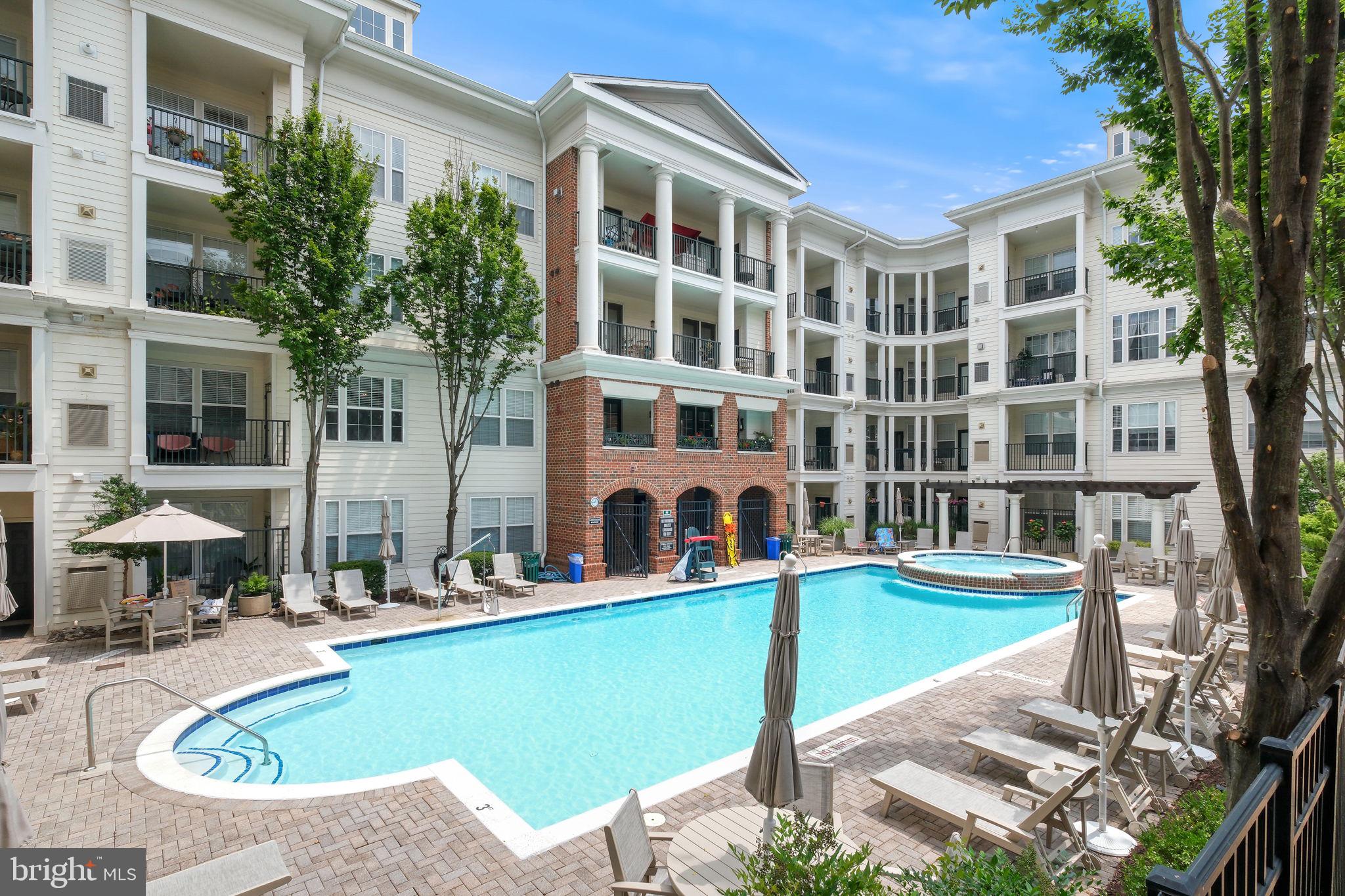 8 Granite Place, Unit 266 Gaithersburg, MD 20878 - Photo 25 of 49 a view of a building with a swimming pool