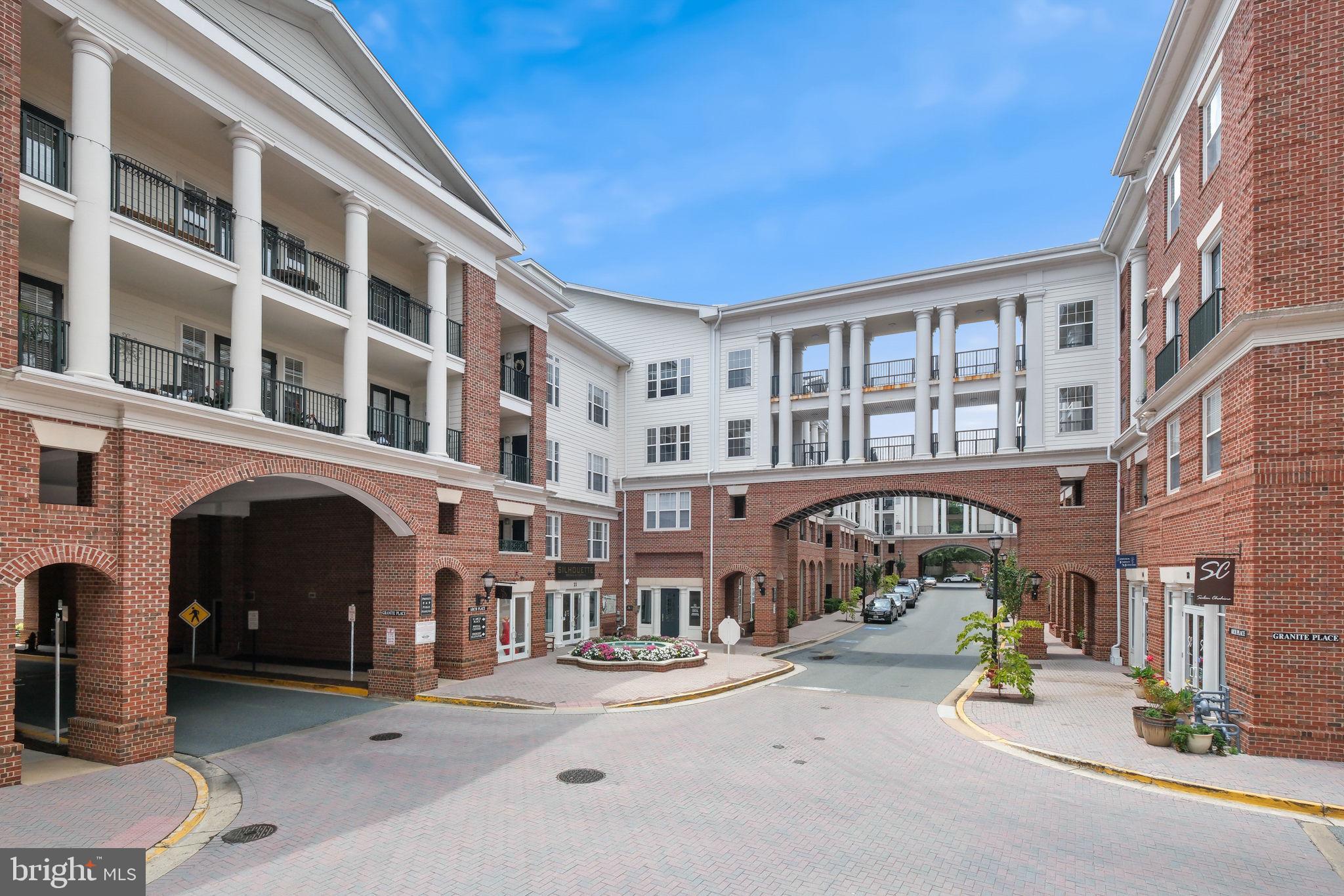 8 Granite Place, Unit 266 Gaithersburg, MD 20878 - Photo 4 of 49 a front view of a building with street