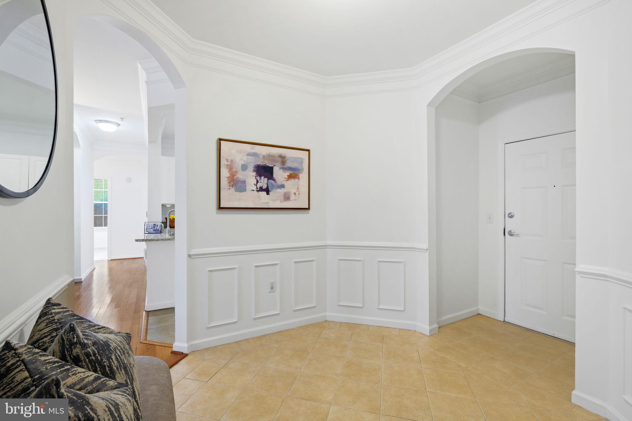 8 Granite Place, Unit 266 Gaithersburg, MD 20878 - Photo 6 of 49 a view of a bedroom with a bed and closet