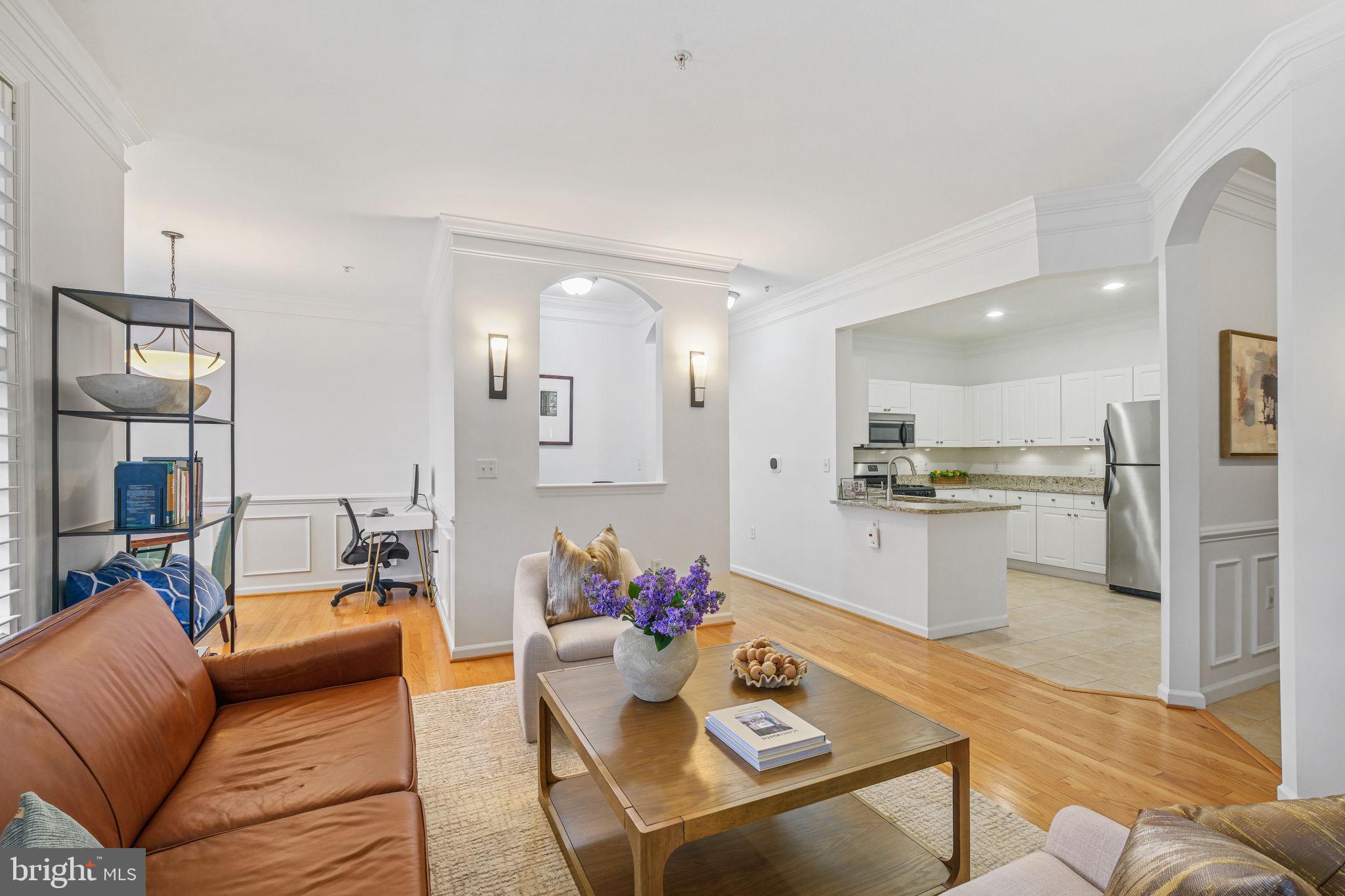 8 Granite Place, Unit 266 Gaithersburg, MD 20878 - Photo 9 of 49 a living room with furniture and kitchen view