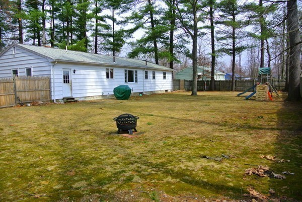 251 High St Extension Lancaster, MA 01523 - Photo 16 of 18 a view of a house with a yard