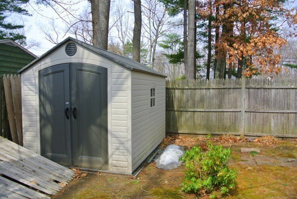251 High St Extension Lancaster, MA 01523 - Photo 17 of 18 a front view of a house with garden