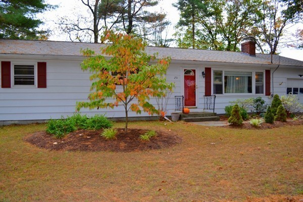 251 High St Extension Lancaster, MA 01523 - Photo 18 of 18 a front view of a house with garden