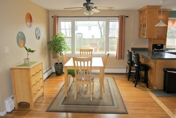 251 High St Extension Lancaster, MA 01523 - Photo 4 of 18 a living room with furniture and a floor to ceiling window