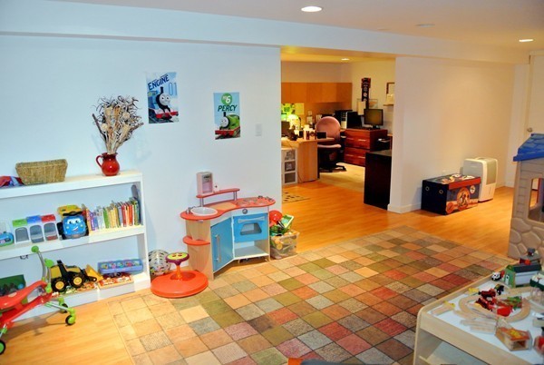 251 High St Extension Lancaster, MA 01523 - Photo 10 of 18 a room with furniture and toys