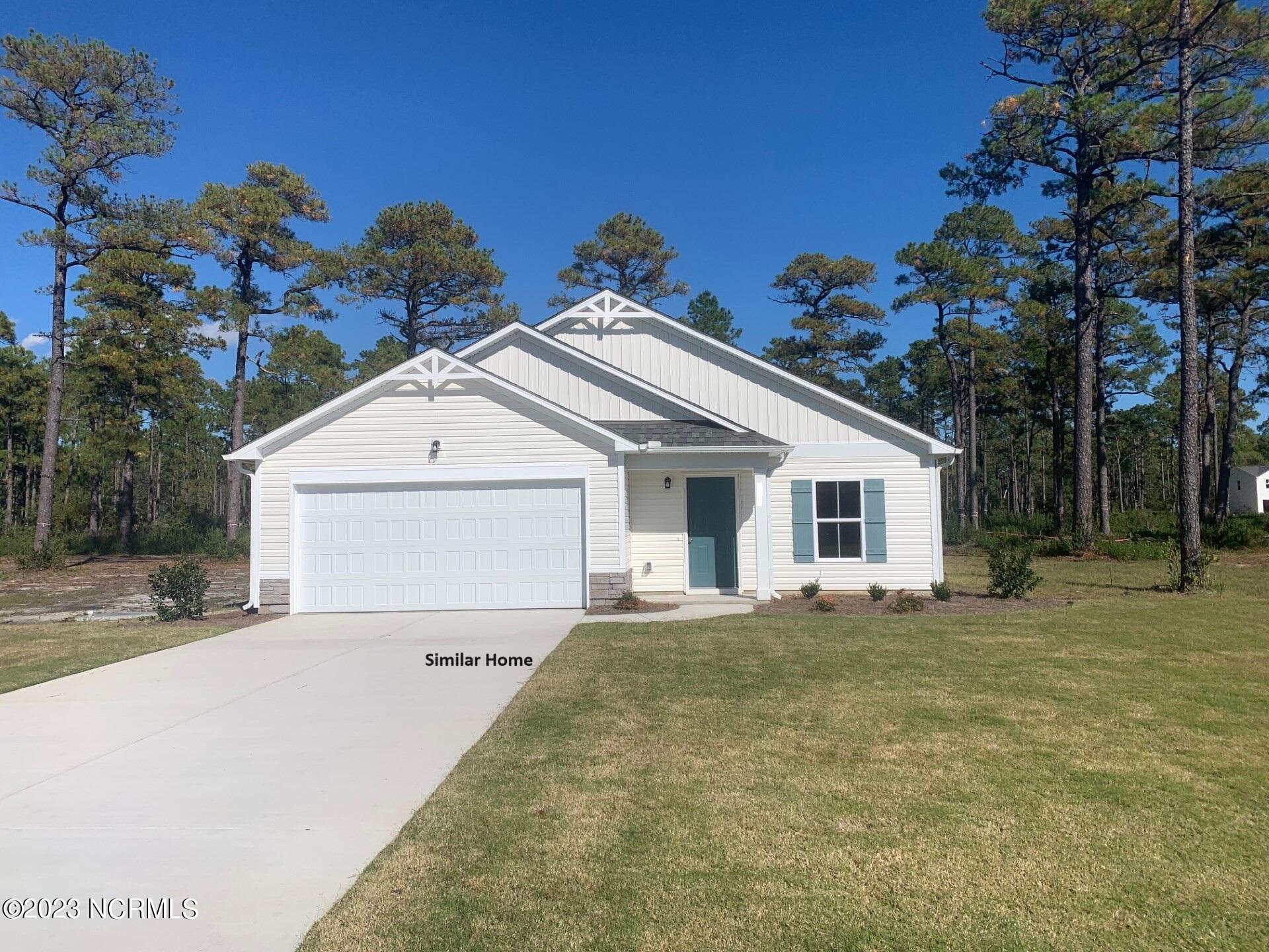 121 Cougar Road Southport, NC 28461 - Photo 1 of 15 Highland front - similar home
