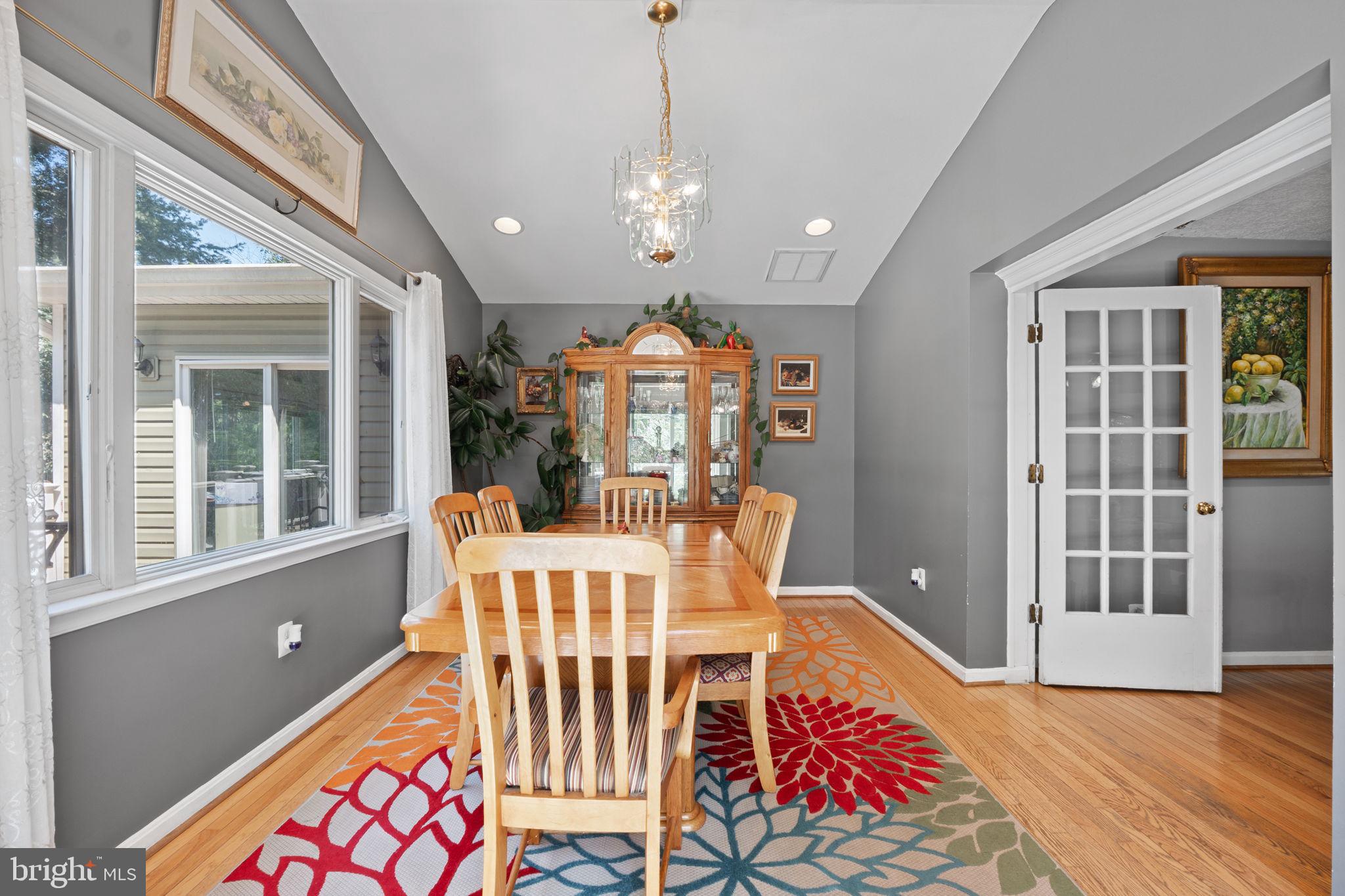 23439 Watson Road Leesburg, VA 20175 - Photo 14 of 41 a view of a dining room with furniture window and wooden floor