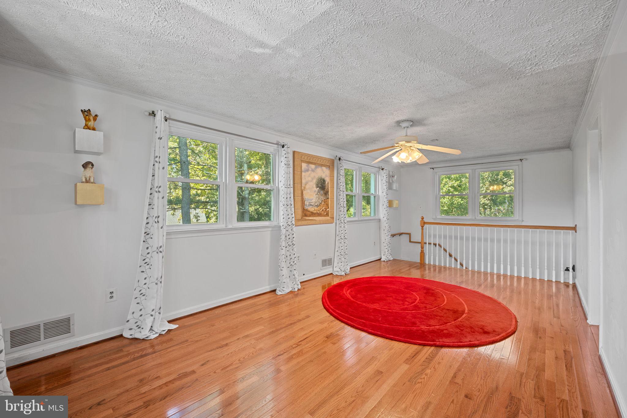 23439 Watson Road Leesburg, VA 20175 - Photo 16 of 41 a view of a livingroom with wooden floor