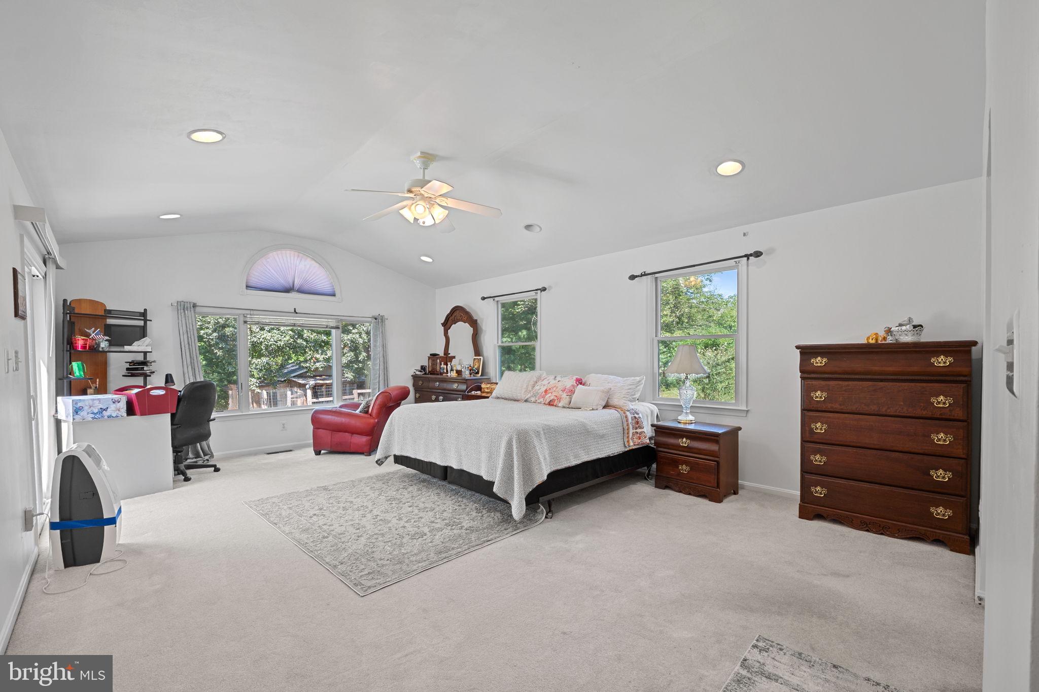 23439 Watson Road Leesburg, VA 20175 - Photo 17 of 41 a bed room with a bed and a window