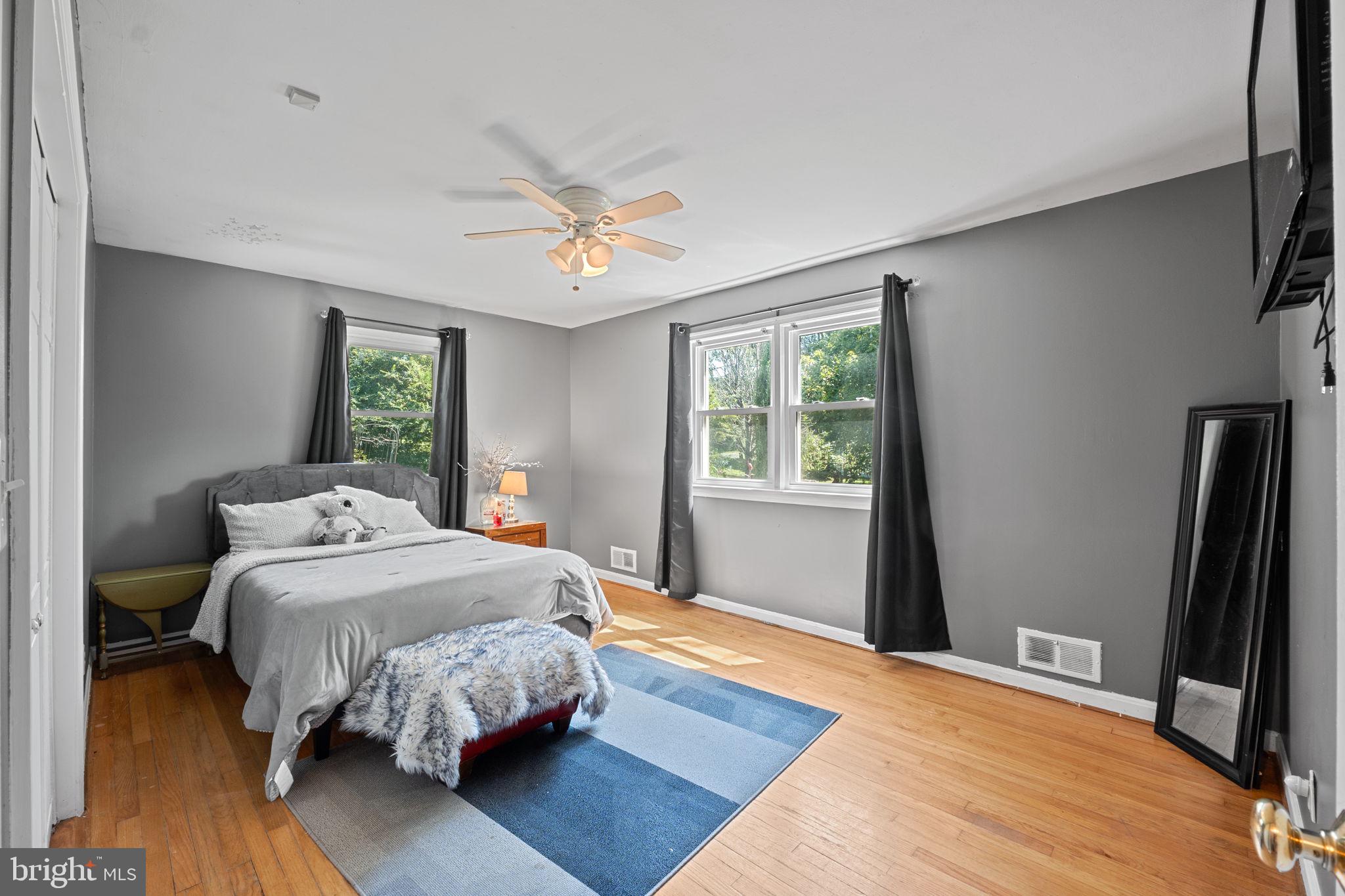 23439 Watson Road Leesburg, VA 20175 - Photo 21 of 41 a bedroom with a bed dresser and a window