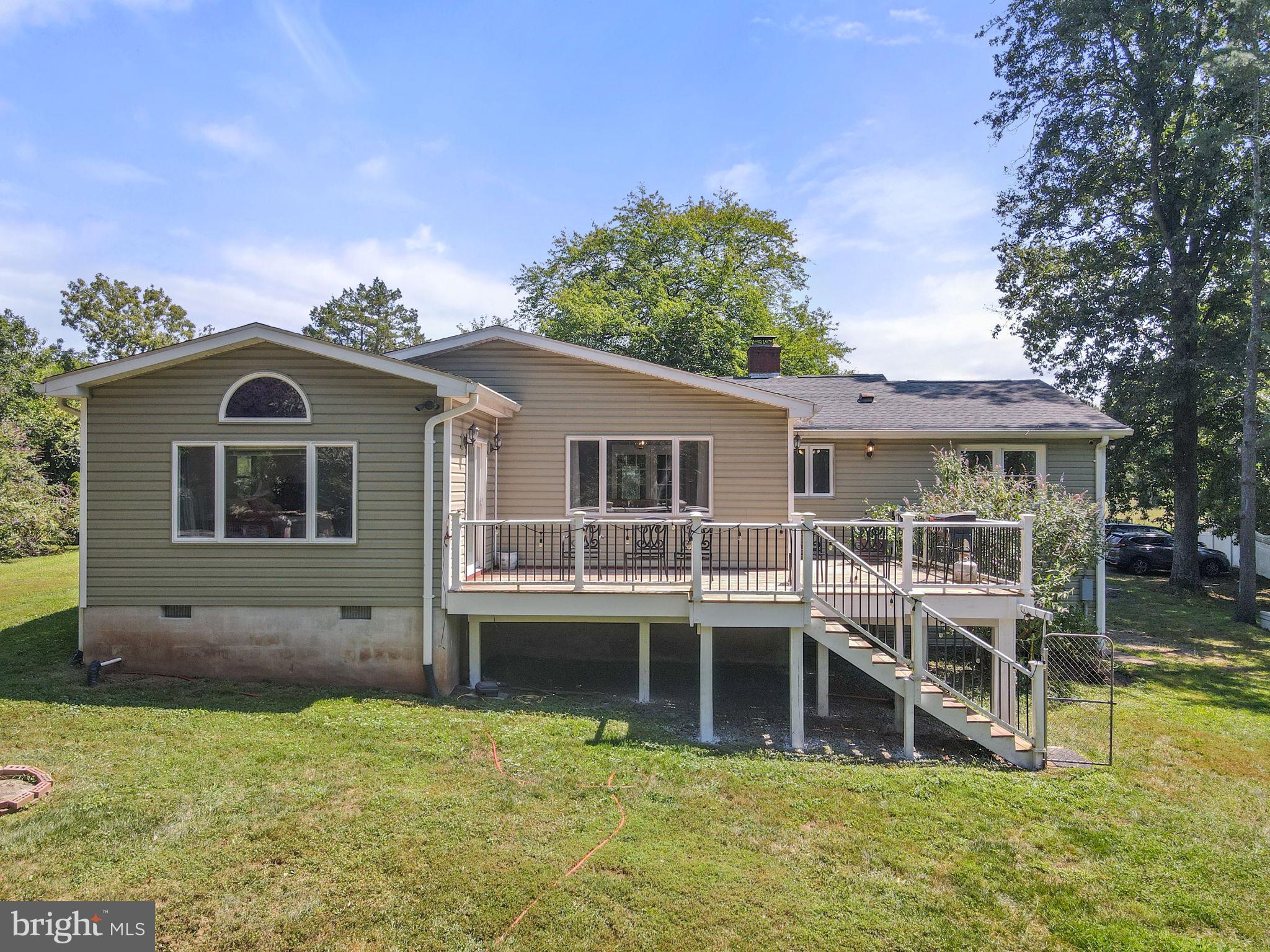 23439 Watson Road Leesburg, VA 20175 - Photo 28 of 41 a view of a house with a swimming pool