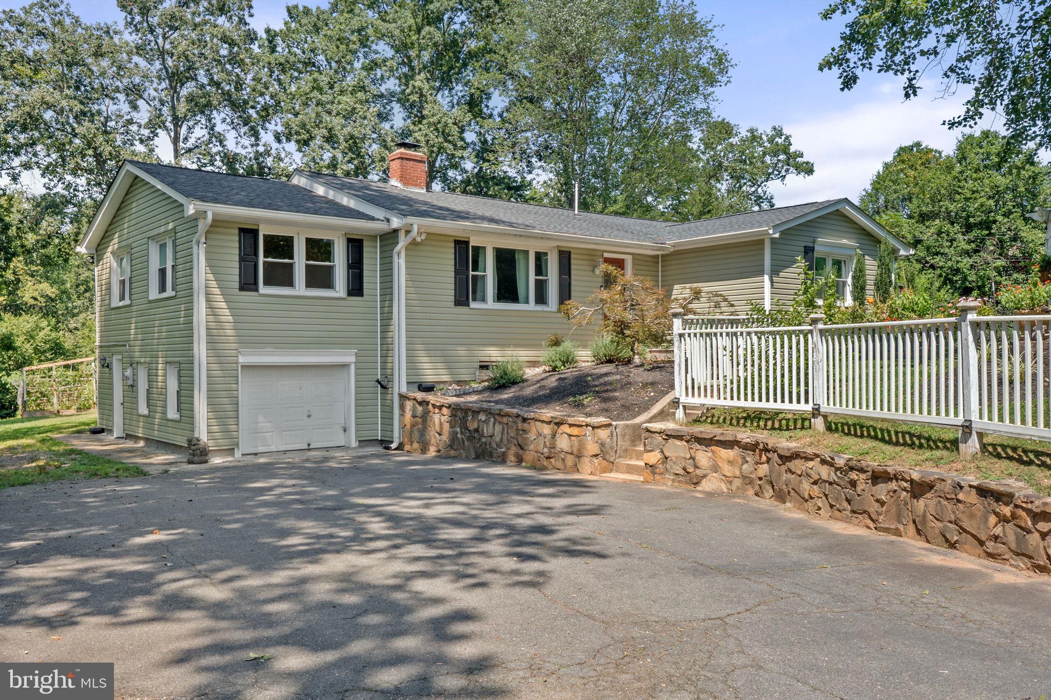 23439 Watson Road Leesburg, VA 20175 - Photo 3 of 41 a view of a house with a outdoor space