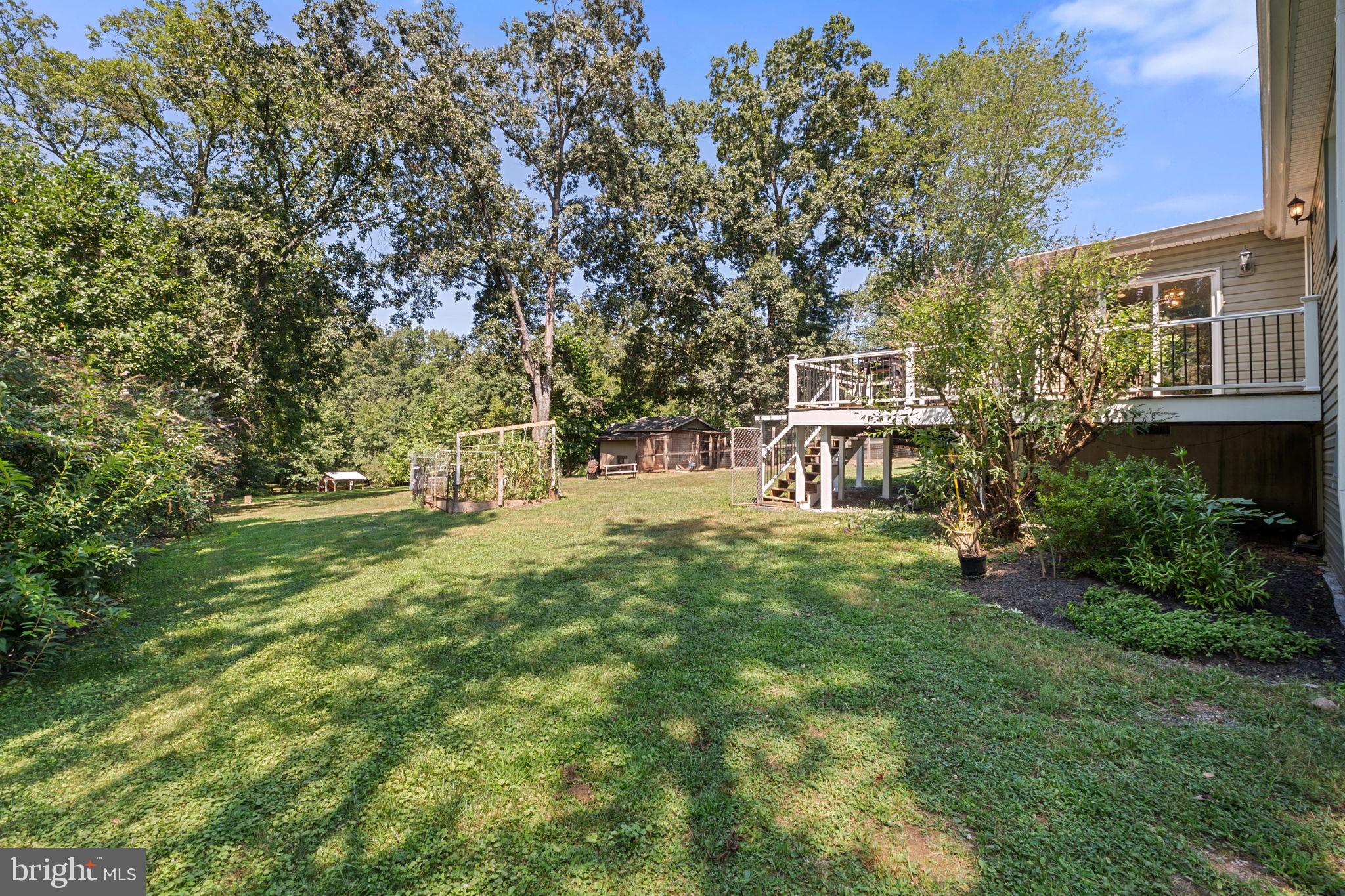 23439 Watson Road Leesburg, VA 20175 - Photo 32 of 41 a view of house with yard