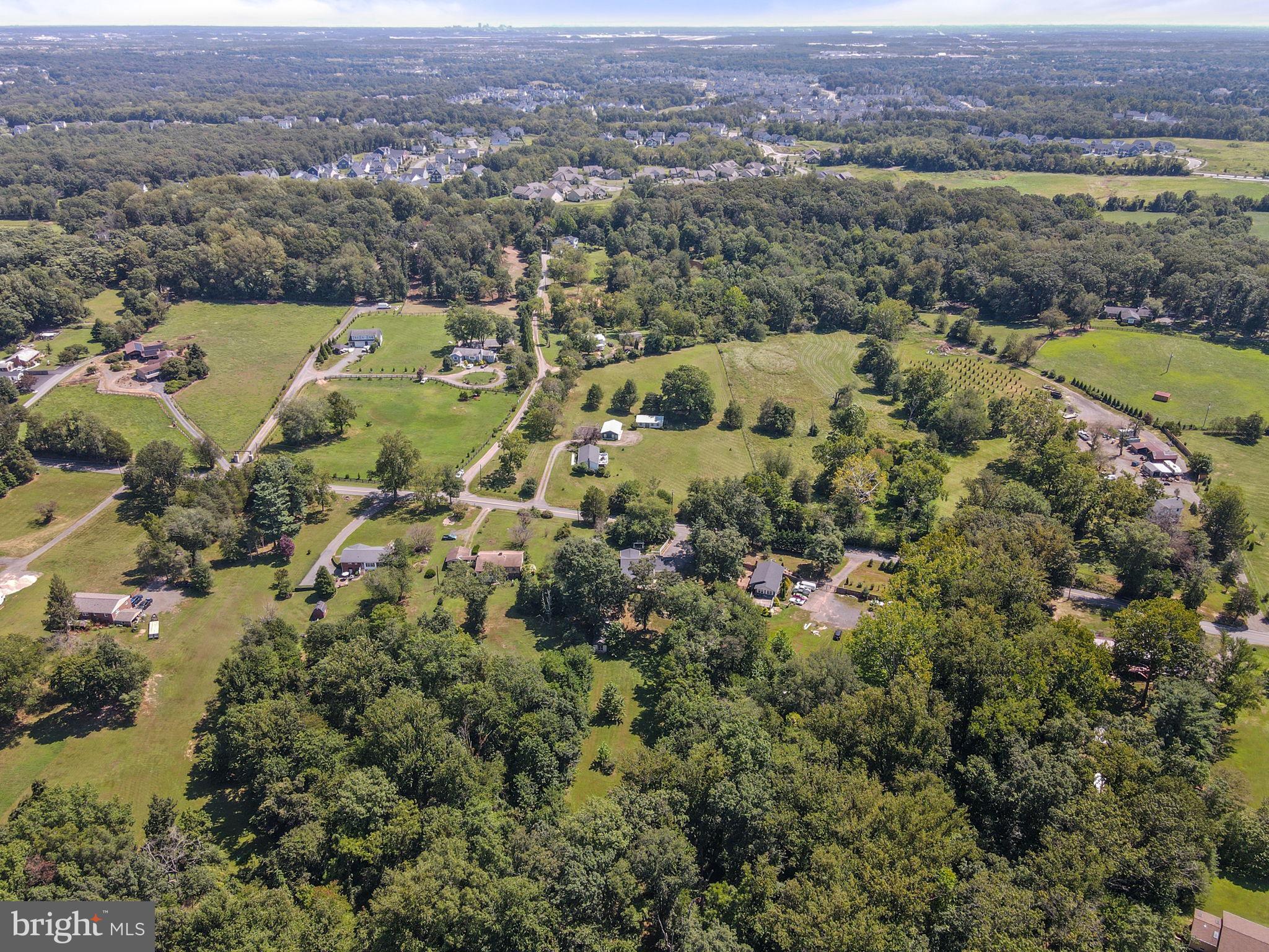23439 Watson Road Leesburg, VA 20175 - Photo 37 of 41 an aerial view of a house with a yard