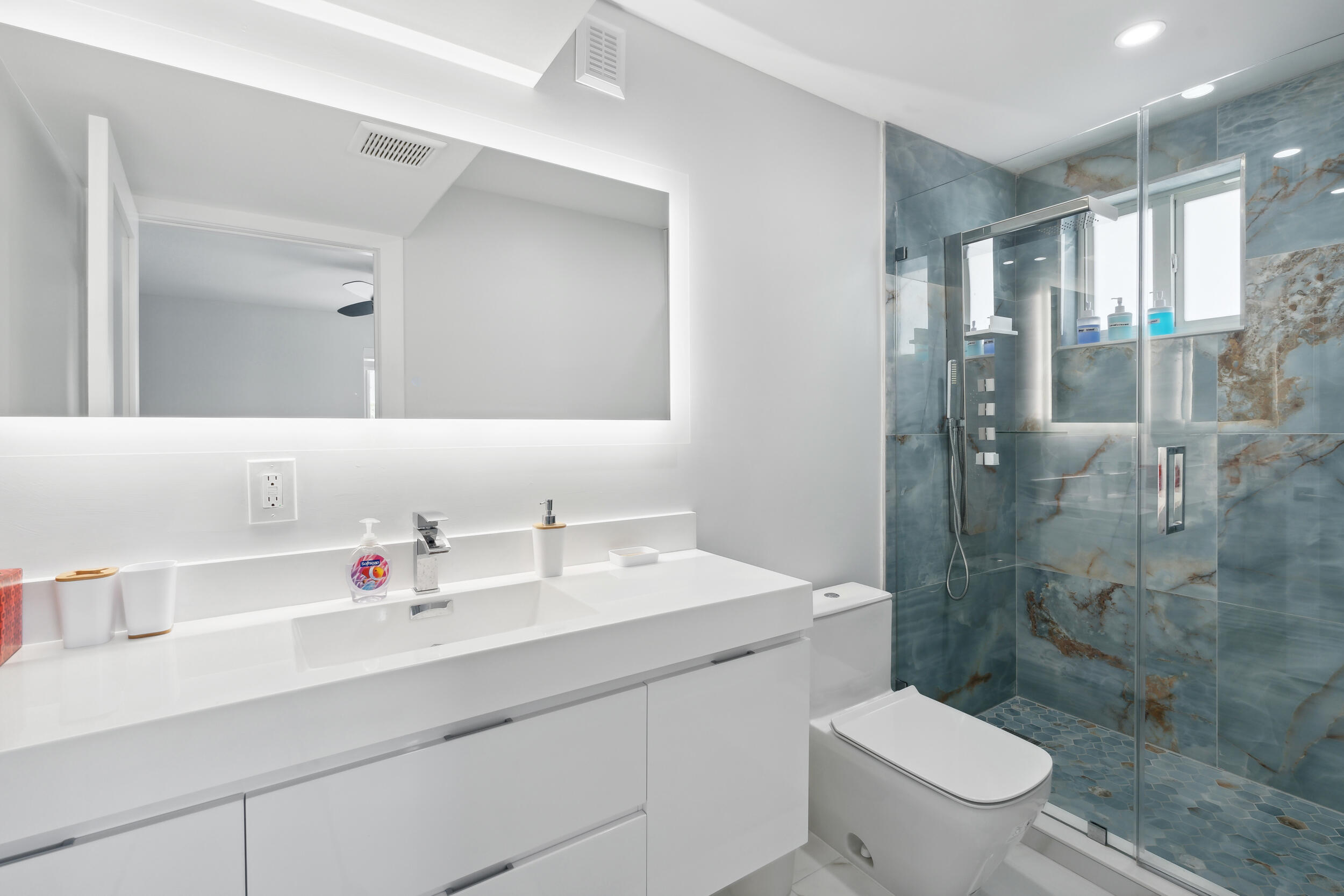 238 Atlantic Boulevard Key Largo, FL 33037 - Photo 39 of 104 a bathroom with a sink a toilet and shower