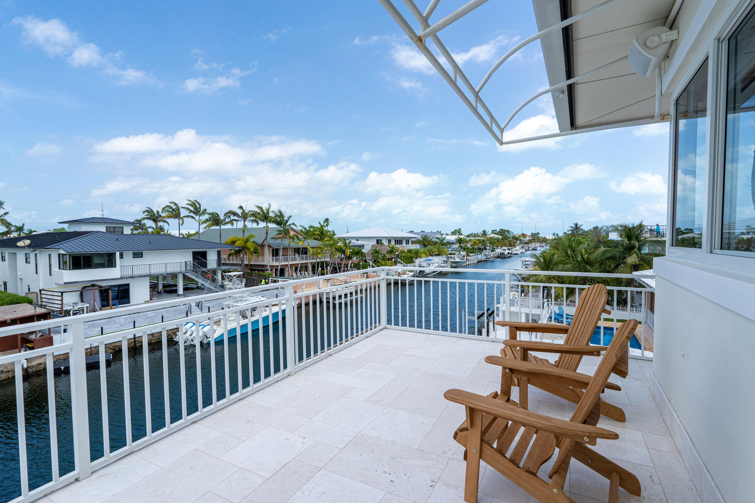 238 Atlantic Boulevard Key Largo, FL 33037 - Photo 60 of 104 a view of a city from a balcony