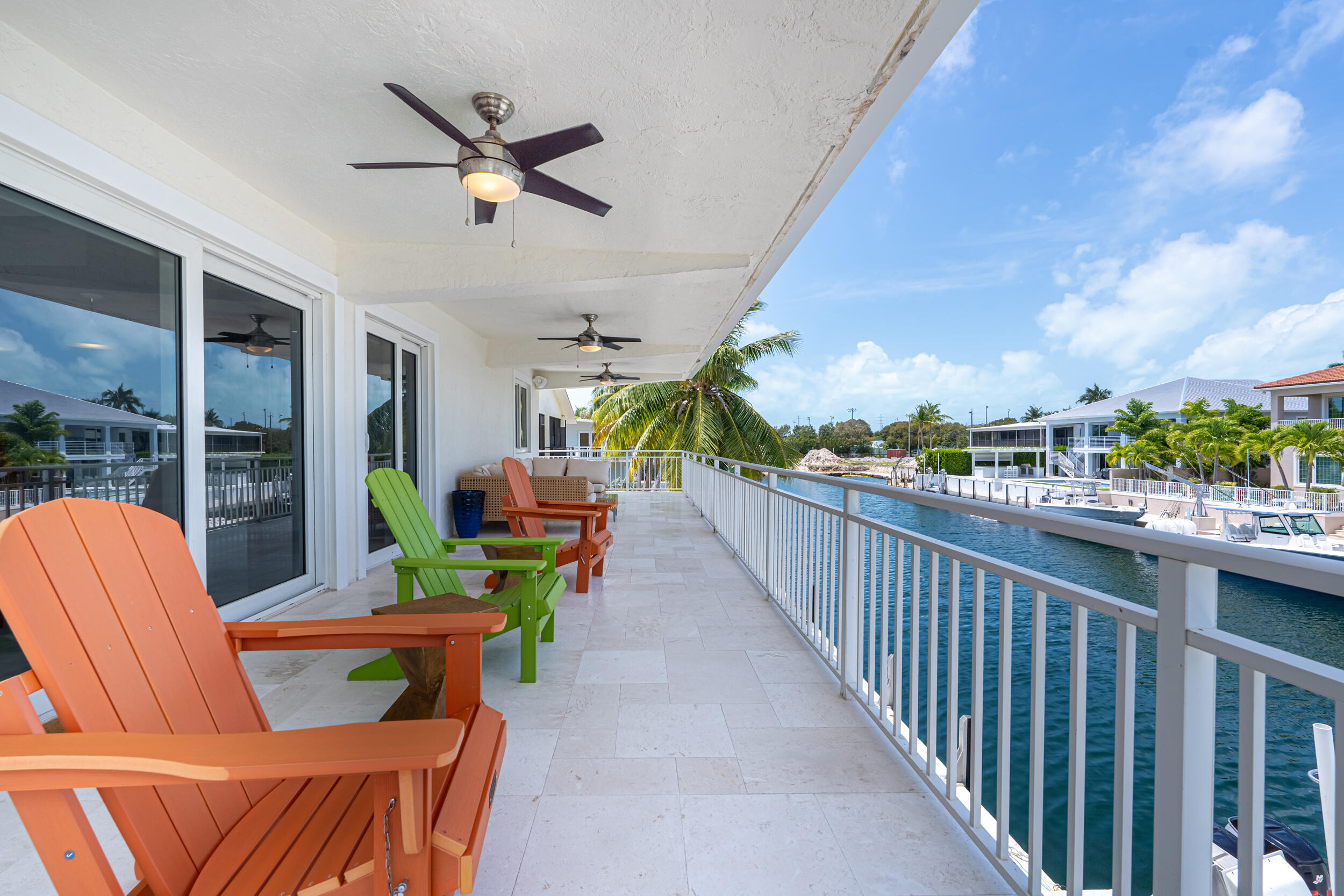 238 Atlantic Boulevard Key Largo, FL 33037 - Photo 66 of 104 a view of a porch with furniture