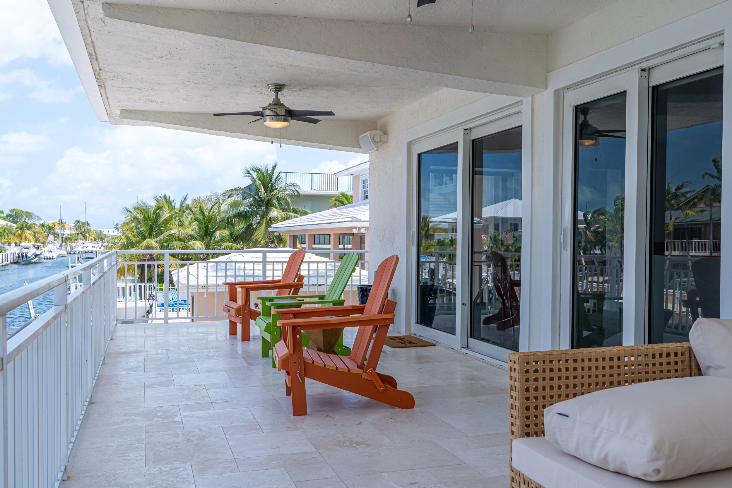 238 Atlantic Boulevard Key Largo, FL 33037 - Photo 70 of 104 a balcony with furniture and a potted plant