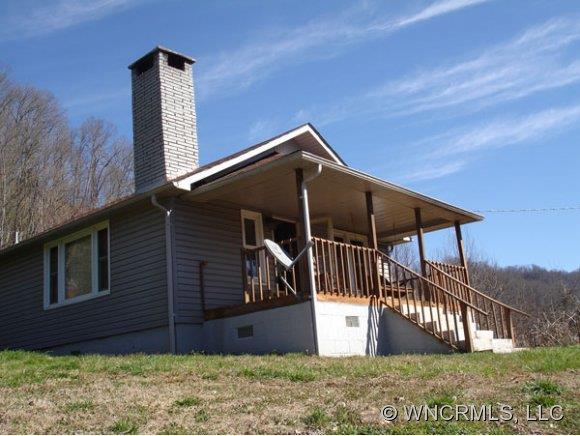 282 Mica Ridge Sylva, NC 28779 - Photo 1 of 11 a front view of a house with a yard