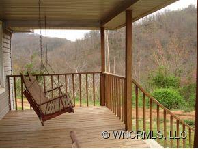 282 Mica Ridge Sylva, NC 28779 - Photo 9 of 11 a view of staircase with railing and wooden floor