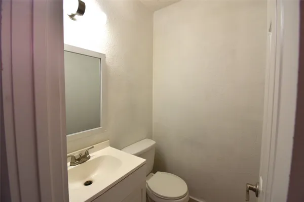 a bathroom with a sink and a toilet