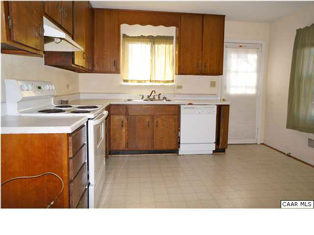 719 Shamrock Road Charlottesville, VA 22903 - Photo 2 of 7 a kitchen with stainless steel appliances granite countertop a stove a sink and a refrigerator