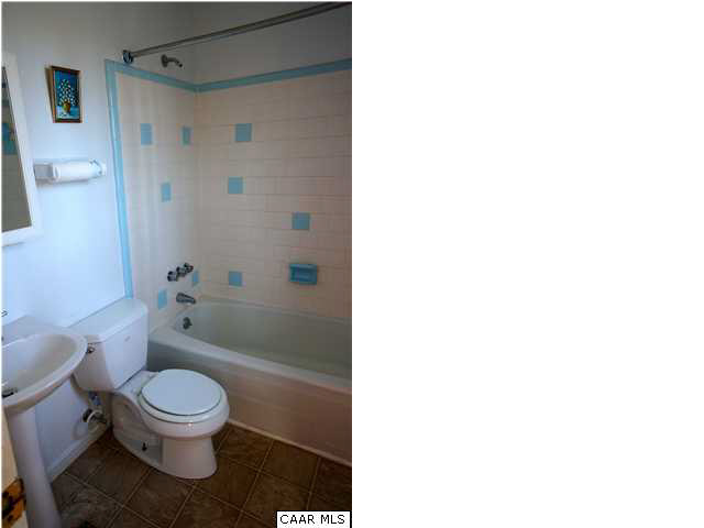 719 Shamrock Road Charlottesville, VA 22903 - Photo 5 of 7 a bathroom with a toilet and a shower