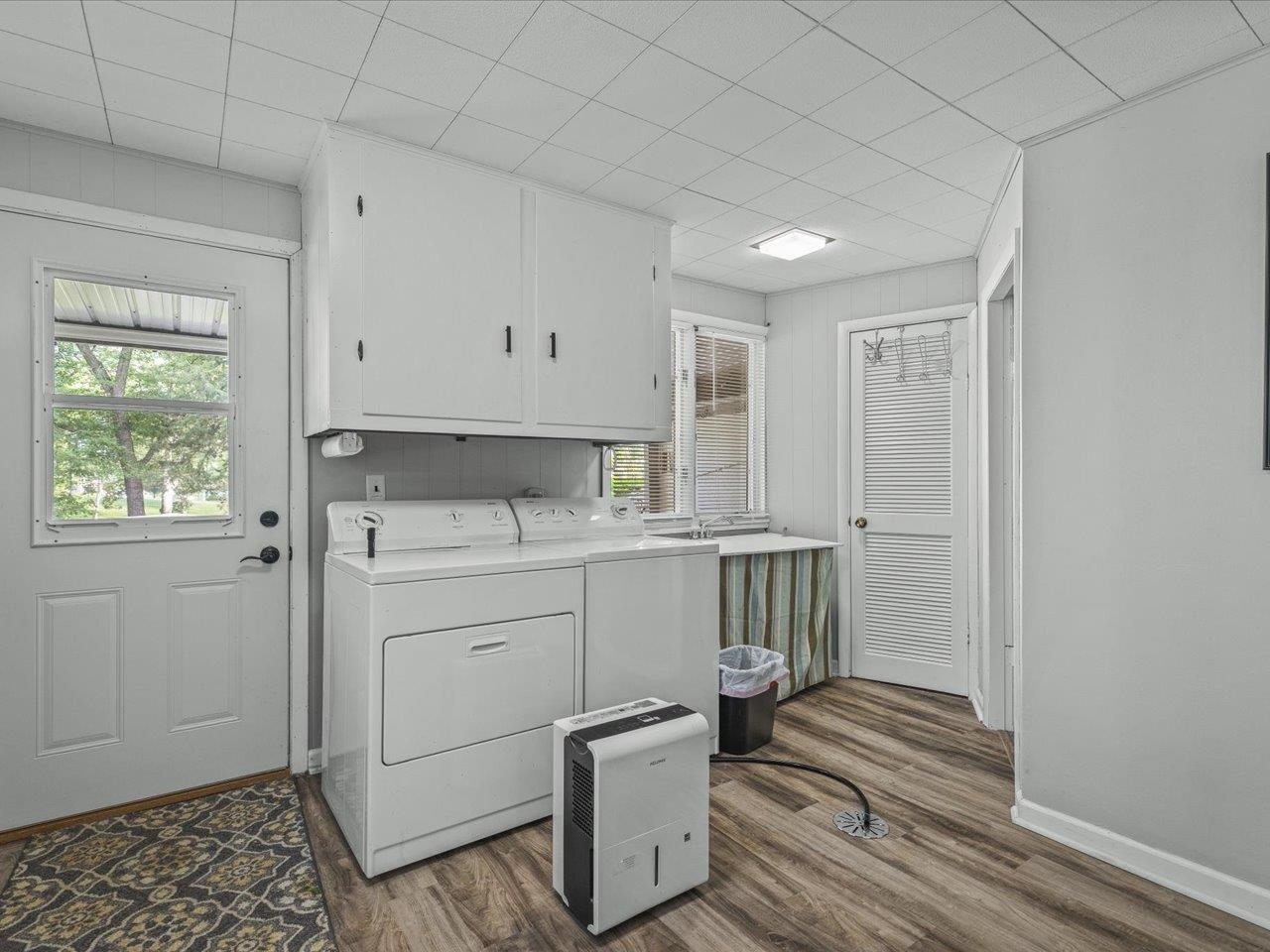 1950 Baintree Road Lake Summerset, IL 61019 - Photo 43 of 61 a room with a white cabinets and wooden floor