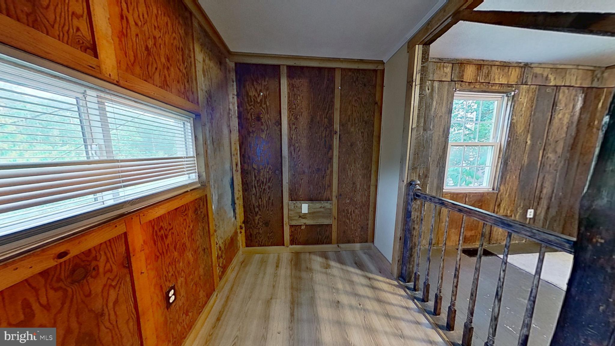 1961 Craley Road Windsor, PA 17366 - Photo 5 of 13 a view of a porch with wooden floor and stairs
