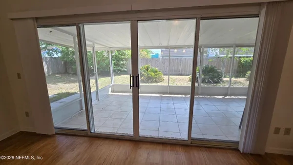 a view of entryway with wooden floor