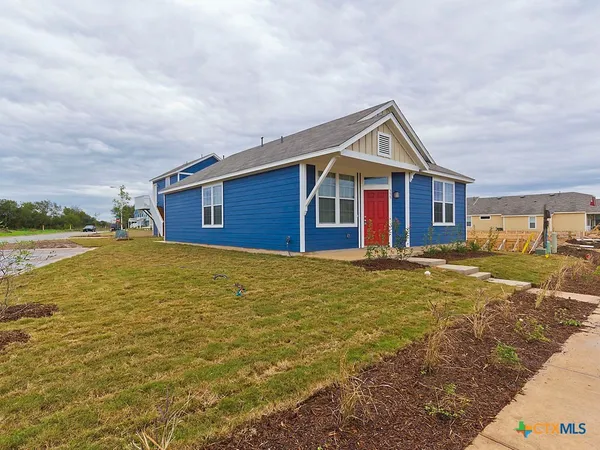 a front view of house with yard
