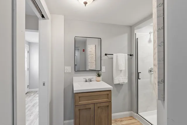 a bathroom with a sink and a mirror
