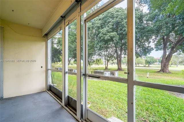 a view of an trees from a room