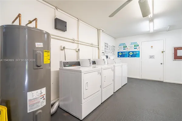 a utility room with dryer and washer