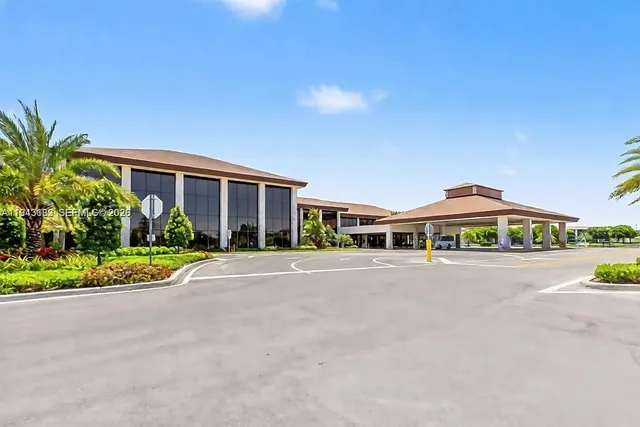a room with gym equipment and a large window