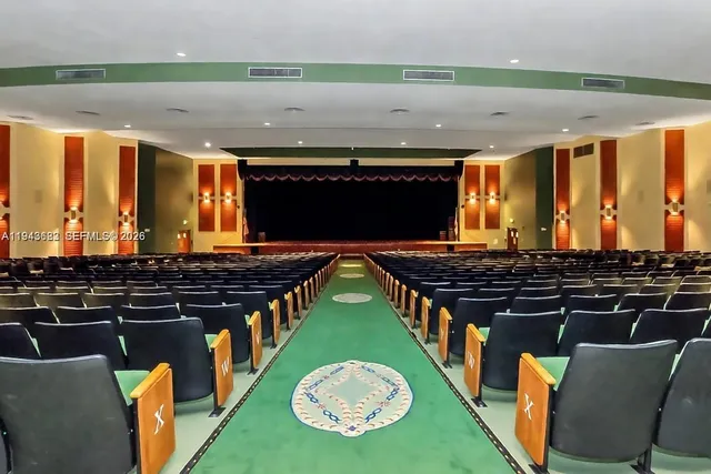 a dining room with lots of tables and chairs