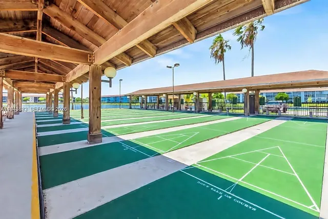 a view of a swimming pool with a lounge chairs