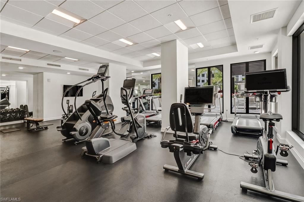 1111 Central Avenue, Unit 203 Naples, FL 34102 - Photo 16 of 19 a view of a room with gym equipment