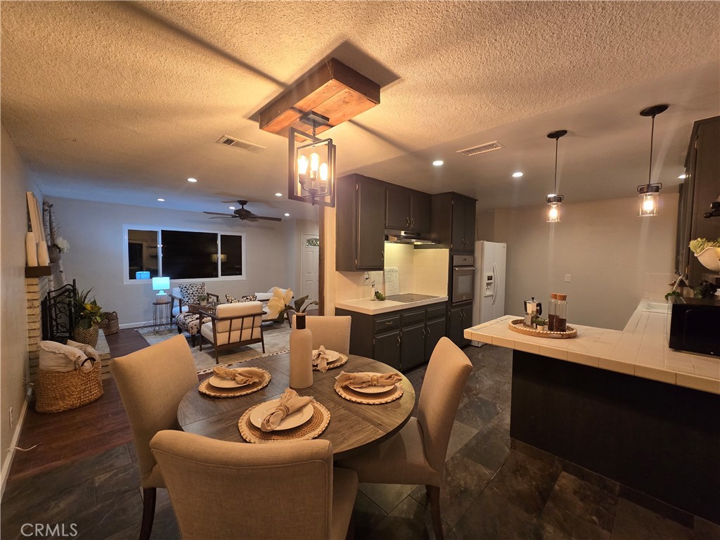 607 Sixth Street Norco, CA 92860 - Photo 12 of 31 a view of a dining room with furniture